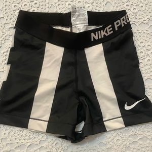 Black and white striped Nike Pro shorts